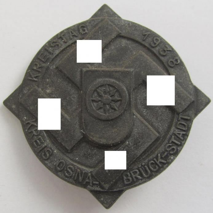 Commemorative - zinc- (ie. pot-metal-) based- and/or greyish-silver-coloured - N.S.D.A.P.-related 'tinnie', being a non-maker-marked example depicting a stylised swastika surrounded by the text: 'Kreistag 1938 - Osnabrück-Stadt'