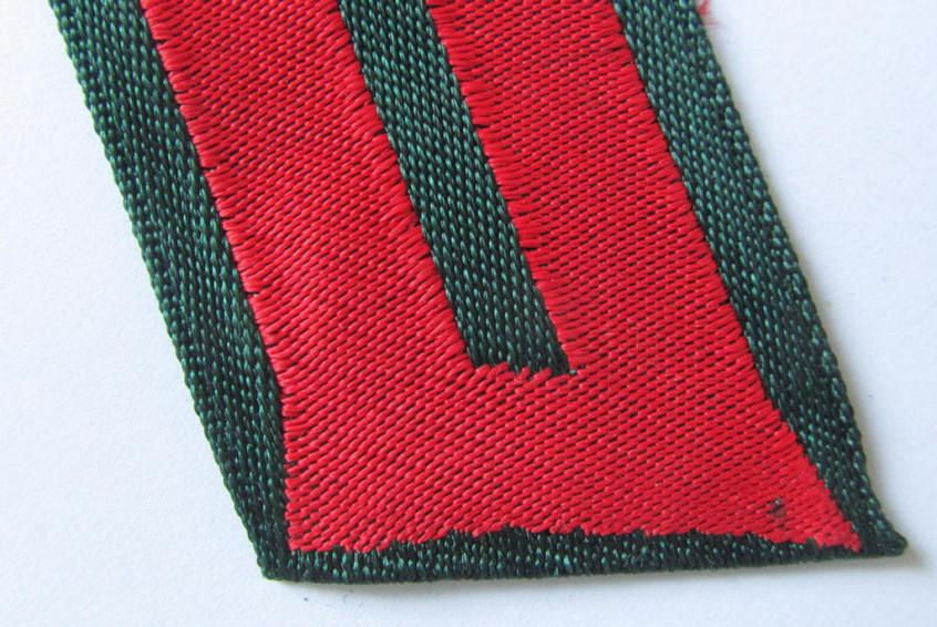 Superb - regrettably single but nevertheless rarely encountered! - so-callled: Eastern volunteers (ie. 'Ostvölker') collar-tab as was specifically intended for a member serving within the 'Russian Liberation Army' (ie. POA)