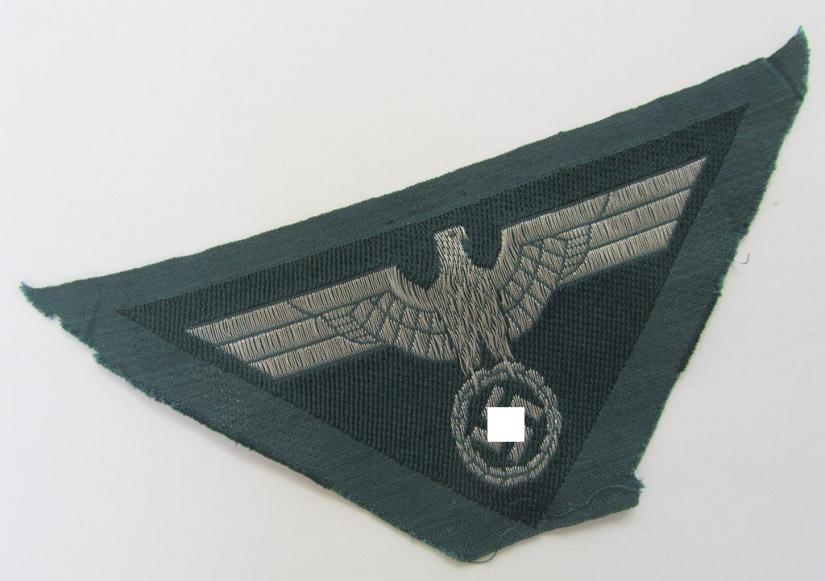 Attractive - and rarely encountered! - later-war-period-, WH (Heeres) ie. 'officers'-type-, so-called: 'M44'-pattern-, trapezoid-shaped breasteagle, being a silver-coloured example as executed in neat 'BeVo'-weave, flat-wire-pattern