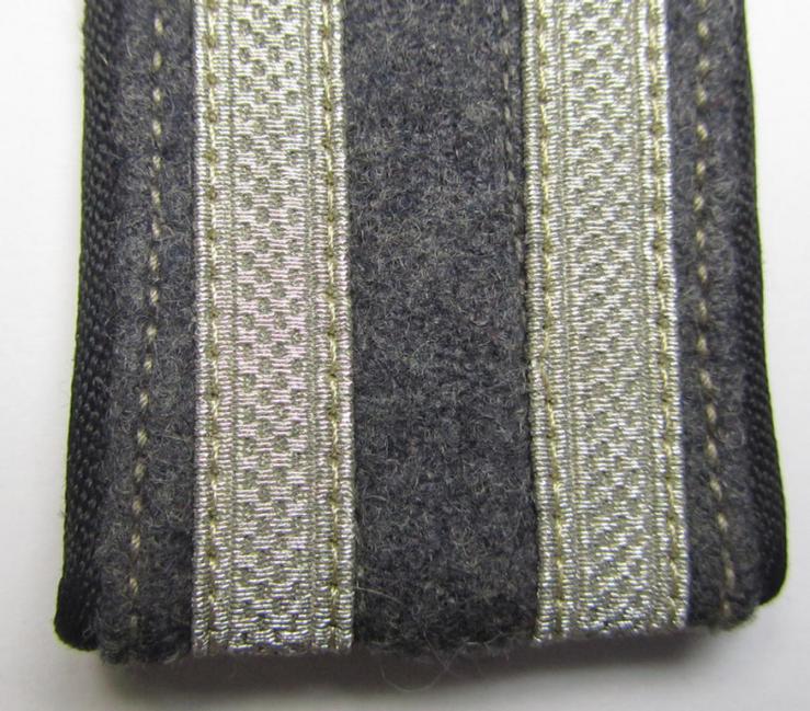 Attractive - albeit regrettably single but nevertheless with certainty rarely encountered - (IMO) NCO-type, so-called: 'Ostvölker' (Luftwaffe-related?) shoulderstrap having the black- ('schwarzer'-) coloured branchcolour