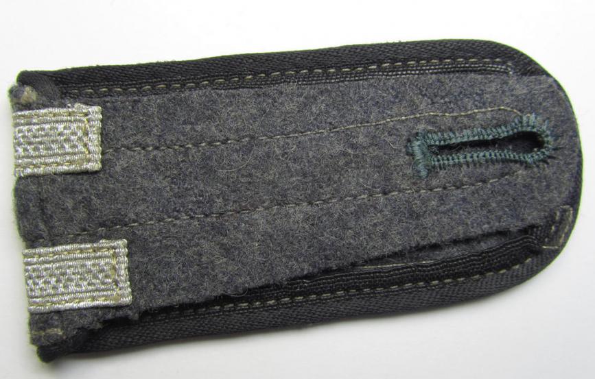 Attractive - albeit regrettably single but nevertheless with certainty rarely encountered - (IMO) NCO-type, so-called: 'Ostvölker' (Luftwaffe-related?) shoulderstrap having the black- ('schwarzer'-) coloured branchcolour