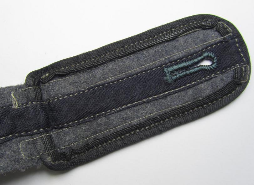 Attractive - albeit regrettably single but nevertheless with certainty rarely encountered - (IMO) NCO-type, so-called: 'Ostvölker' (Luftwaffe-related?) shoulderstrap having the black- ('schwarzer'-) coloured branchcolour