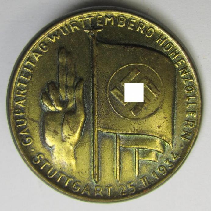 Commemorative - copper-based-, N.S.D.A.P.-related 'tinnie', being a non-maker-marked example depicting an upright hand and various 'swastika'-banners surrounded by the text: 'Gauparteitag Württemberg Hohenzollern - Stuttgart - 25.2.1934'
