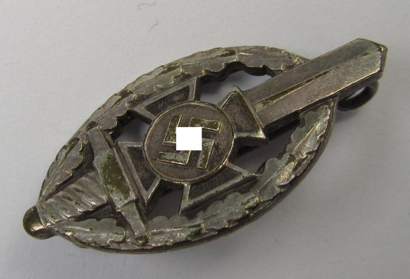 Membership-lapel-pin as was intended to signify membership within the: 'Nationalsozialistischer Kriegsopferversorsung' (ie. 'N.S.K.O.V.') being a maker- (ie. 'Deschler'-) marked example that also shows a: 'Ges.Gesch.'-patent-pending-designation