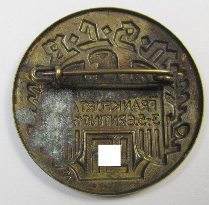 Commemorative, tin-based- and/or: golden-bronze-coloured, early-period N.S.L.B.-related 'tinnie' being a non-maker marked example depicting a 'Reichsadler'-device and bearing the text: '3. Reichstagung - Frankfurt a.M. - 3.-5. Ernting 1934'