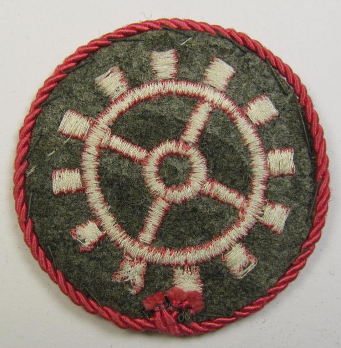 WH (Heeres ie. 'Panzer'-) machine-embroidered-, trade- ie. special-career patch, having a not that often encountered (bright-pink-coloured) 'Kordel' (ie. 'Umrandung') attached, as was intended for a: 'Panzerwarte o. Kfz.-Warte der I. Klasse'