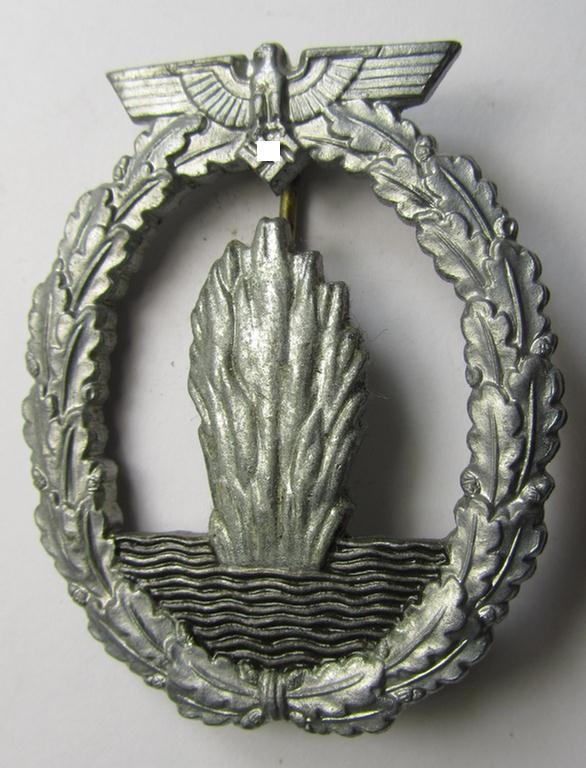 Later-war-period, WH (Kriegsmarine) 'Kriegsabzeichen für Minensuch-, U-Boot-Jagd und Sicherungs-Verbände' being a detailed and non-maker-marked, 'Feinzink'-based example as was produced by the 'S&L'-company