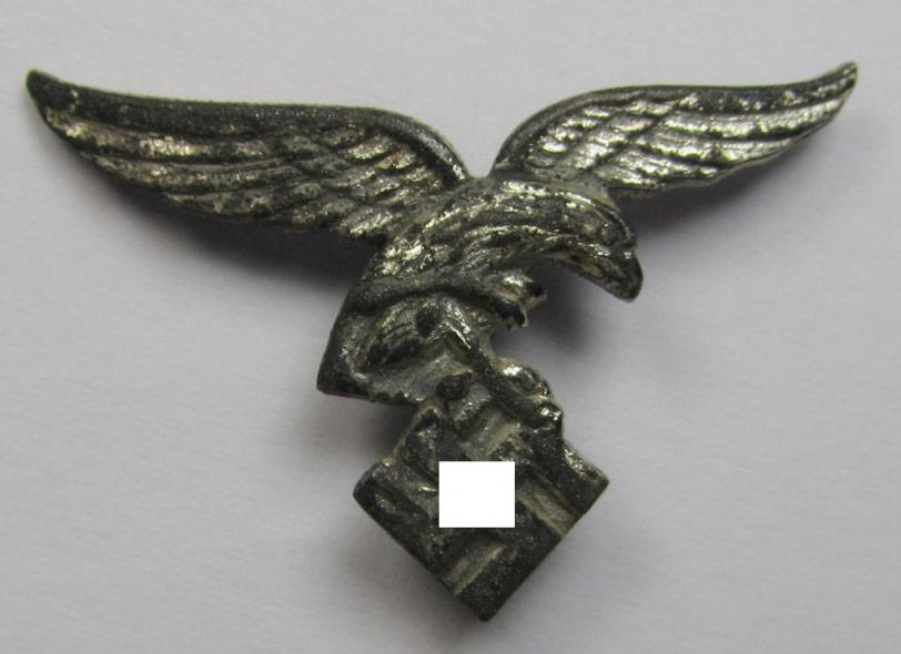 Bright-silver-toned lapel-pin (ie. 'Zivilabzeichen') to be worn on the civil attire as was intended for usage by the various staff-members of the 'Luftwaffe' (depicting an early-pattern- ie. 'down-tailed'-eagle)