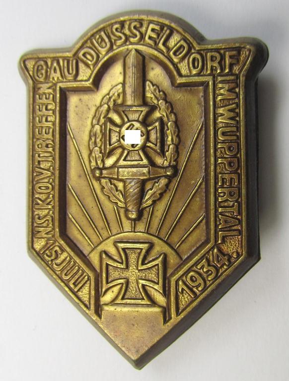 Commemorative golden-bronze-toned and/or tin-based: 'N.S.K.O.V.'-related 'tinnie' being a maker- (ie. 'A. Bonner - Elberfeld'-) marked example showing the text: 'N.S.K.O.V.-Treffen - Gau Düsseldorf im Wuppertal - 15. Juli 1934'