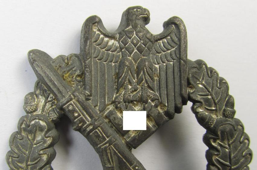 Superb, 'hollow-back' 'Infanterie Sturmabzeichen in Silber' (or: silver infantry-assault badge ie. IAB) being a non-maker-marked example as executed in zinc-based metal (ie. 'Feinzink') as was produced by the: 'Wilh. Deumer'-company