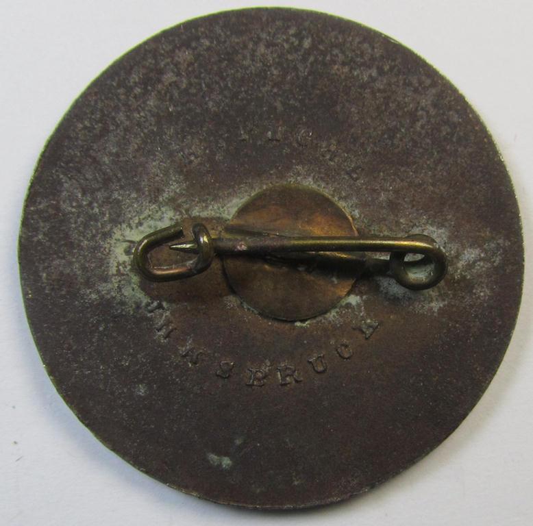 Attractive, WHW- (ie. 'Winterhilfswerke'-) related day-badge (ie. 'tinnie') or: 'Veranstaltungsabzeichen des Standschützenverbandes Tirol-Vorarlberg' depicting the text: 'W.H.W. Opferschiessen 1942/43'