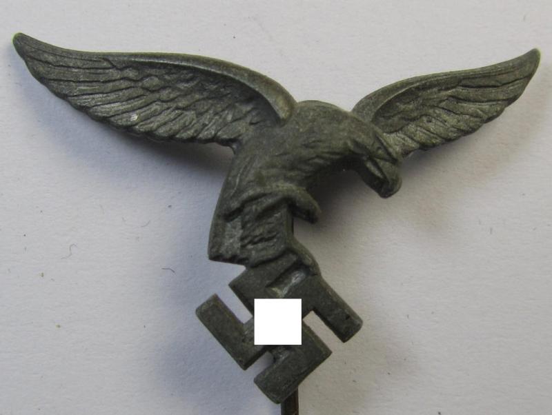 Silverish-grey-toned lapel-pin (ie. 'Zivilabzeichen') to be worn on the civil attire as was intended for usage by the various staff-members of the 'Luftwaffe' (depicting an early-pattern- ie. 'down-tailed'-eagle)