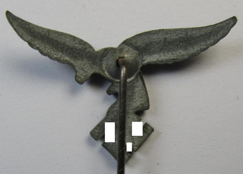 Silverish-grey-toned lapel-pin (ie. 'Zivilabzeichen') to be worn on the civil attire as was intended for usage by the various staff-members of the 'Luftwaffe' (depicting an early-pattern- ie. 'down-tailed'-eagle)