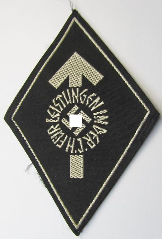 HJ/BDM- (ie. 'Hitlerjugend'/'Bund Deutscher Mädel'-) so-called: 'Leistungsabzeichen in Silber' being a cloth-based version as executed in the neat: 'BeVo'-weave pattern that comes in a never worn albeit period-folded, condition