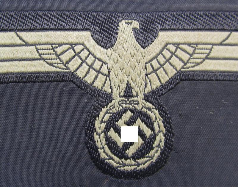 Later- (ie. mid-war-) period, WH (Heeres) 'Panzer'-type breast-eagle (ie. 'Brustadler für Panzertruppen') being a 'virtually mint- ie. unissued' example as executed in bluish-grey-coloured linnen on a black-coloured background