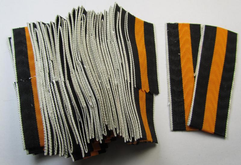 Neat spare-part: a bright-orange-coloured(!), non-confectioned- (ie. full length- and 19 cms. long-sized-) ribbon (ie. 'Bandabschitt') for the: WH Czech occupation-medal: '1 October 1938' and that comes in 'virtually mint ie. unissued condition