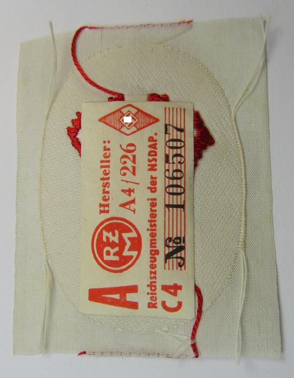 HJ/BDM (ie. 'Hitlerjugend'/'Bund Deutscher Mädel') trade- or specialist armbadge as executed in neat 'BeVo'-weave pattern as was intended for usage by a: 'Feldscher' (or: medical orderly) still retaining its period 'RzM'-etiket