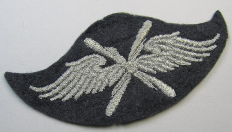Machine-embroidered, WH (Luftwaffe) trade- ie. special-career-patch as was specifically intended for: 'Fliegendes Personal' and that comes in a possibly issued- albeit 'virtually mint' and/or never tunic-attached, condition