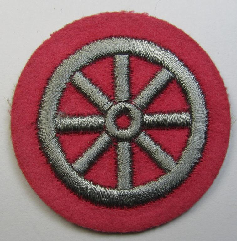 Neat example of a HJ ('Hitlerjugend') 'Motor-HJ Prüfungsabzeichen' (or: motor-proficiency badge)  being an example of the silver-class that still retains  its period-attached 'RzM'-etiket