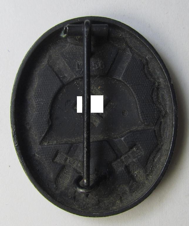 Attractive - and neatly maker- (ie. 'L/56'-) marked! - example of a black-class wound-badge (or: 'Verwundeten-Abzeichen in Schwarz') as was produced by the maker (ie. 'Hersteller'): 'Funcke & Brüninghaus'