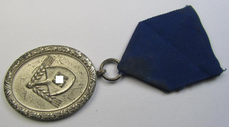 Attractive example of a: RAD (ie. 'Reichsarbeitsdienst') so-called: 'Dienstauszeichnung 3. Stufe für Männer' (as was intended for 12 years loyal-service) and that comes mounted on its period piece of ribbon (ie. 'Bandabschnitt')