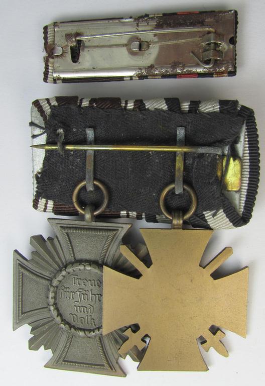 Superb, 2-pieced N.S.D.A.P.-related medal-bar (ie. 'Ordenspange') showing resp. an: a: 'FKK 1914-18 mit Schwn.' and a: 'N.S.D.A.P.-Dienstausz. in Bronze' (ie. '3. St. für 10 Jahre t. D.') that both come mounted as a (detachable!) 'Doppelspange'
