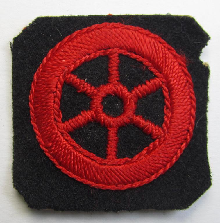 Attractive - and presumably Dutch-produced - example of an early-pattern and neatly hand-embroidered WA- (or: 'Weerafdelingen'-) related 'Motor WA'-breast-badge (ie. in Dutch language 'Dienstonderscheidingsteken der Motor-WA')