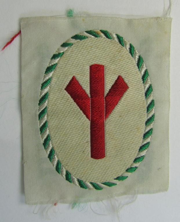 Attractive - and rarely encountered! - HJ/BDM (ie. 'Hitlerjugend'/'Bund Deutscher Mädel') trade- or specialist-armbadge as was executed in neat 'BeVo'-weave pattern as was specifically intended for a: 'Gefolgschaftsfeldscher'