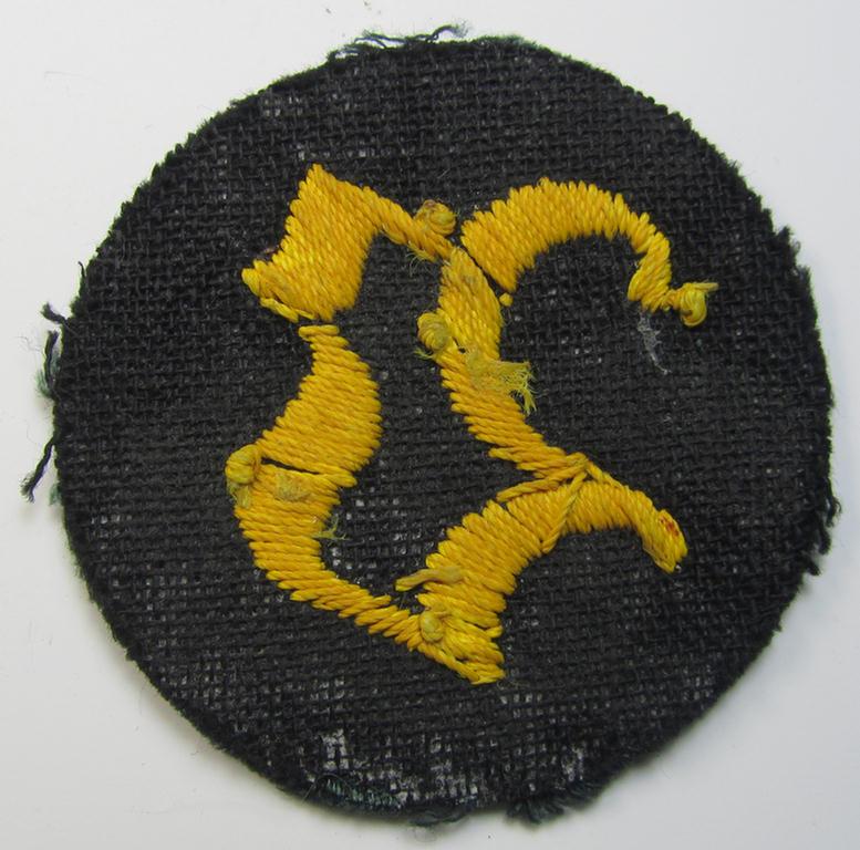 Attractive, WH (Heeres) so-called: trade- and/or special career arm-insignia, as was intended for a: 'Zahlmeister-Anwärter o. Verwaltungs-Unteroffizier' being a neatly hand-embroidered variant as executed on darker-green-coloured wool