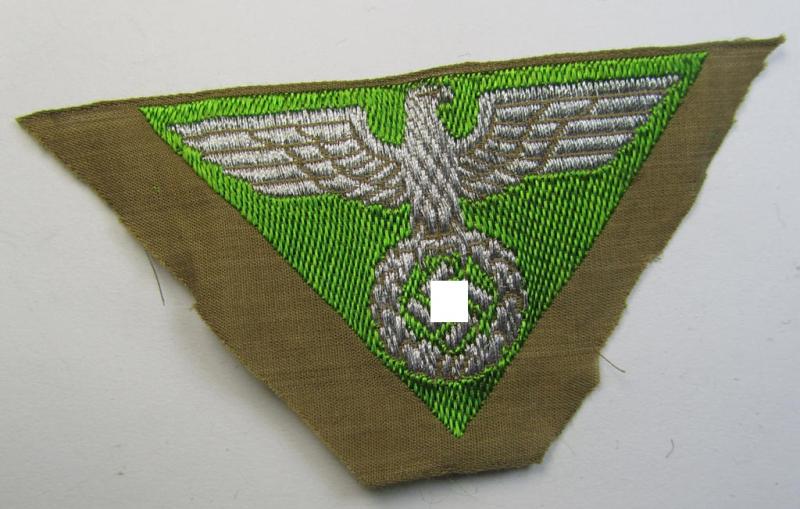 Neat, SA-related cap-eagle as was intended for the: 'Lagermütze' (ie. side-cap) being an example as woven in grass-green on a brownish-coloured background and as such intended for members within the: 'SA-Gruppe Nordmark o. Sachsen'