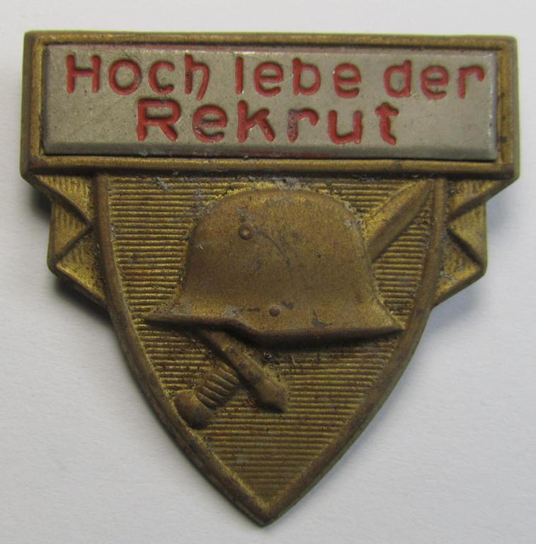 Commemorative, WHW- (ie. 'Winterhilfswerke'-) related 'tinnie' being a non-maker marked example depicting a steel-helmet and sword and showing the text: 'Hoch lebe der Rekrut'