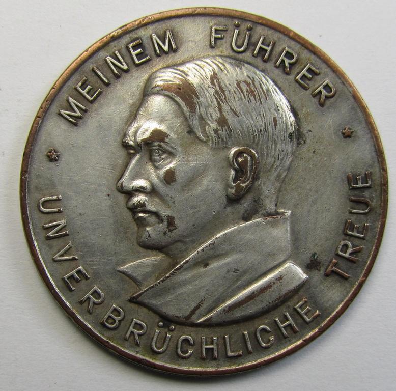 Neat 'Buntmetall'-based, WHW-related supporter plaque (ie. 'Erinnerungs- o. nichttragbare Auszeichnungsplakette') that shows a portrait of the: 'Reichskanzler' Adolf Hitler surrounded by the text: 'Meinem Führer - Unverbrüchliche Treue'