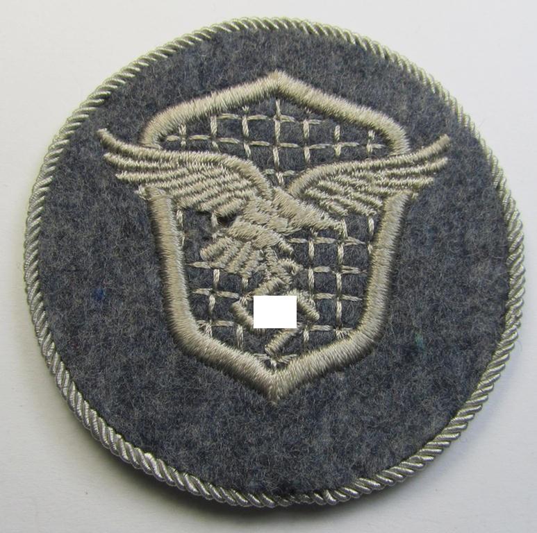 Attractive - and 'virtually mint' - example of a WH (Luftwaffe) machine-embroidered, trade- ie. special-career-patch (ie. 'Tätigkeitsabzeichen') having a silverish-grey-toned 'Kordel' attached as was intended for: 'LW-Kraftfahrpersonal'