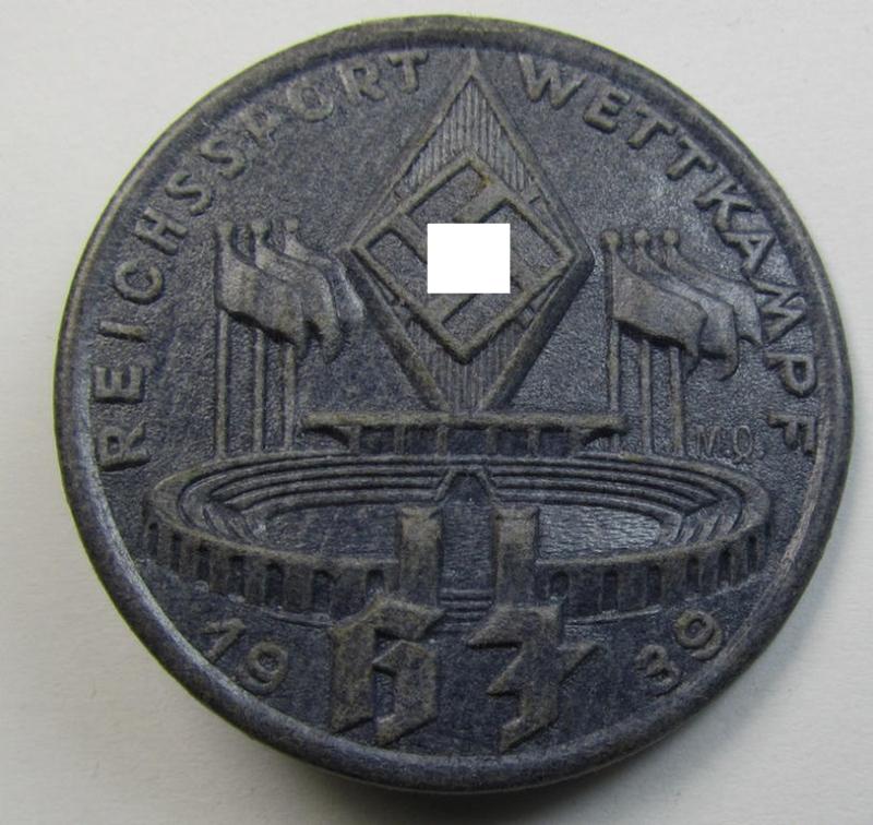 Commemorative - bluish-grey-coloured and/or: carton-based(!) - 'HJ'- (ie. Hitlerjugend-) related 'tinnie' depicting a sports-complex and 'HJ-Raute' and showing the text: 'Reichssport Wettkampf HJ - 1939'