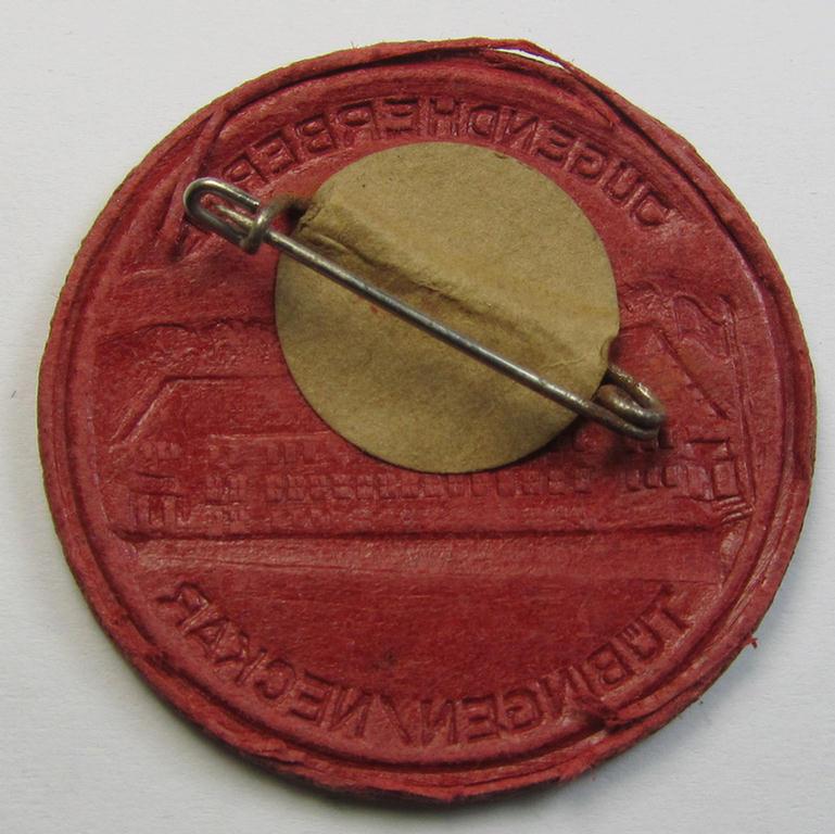 Youth- (ie. 'HJ'- or: DJH or: 'Reichsverb. für deutsche Jugendherbergen'-) related 'tinnie' (ie. 'Veranstaltungsabzeichen') as executed in brownish-red-coloured- and/or carton-based material and showing the text: 'Jugendherberge Tübingen/Neckar'