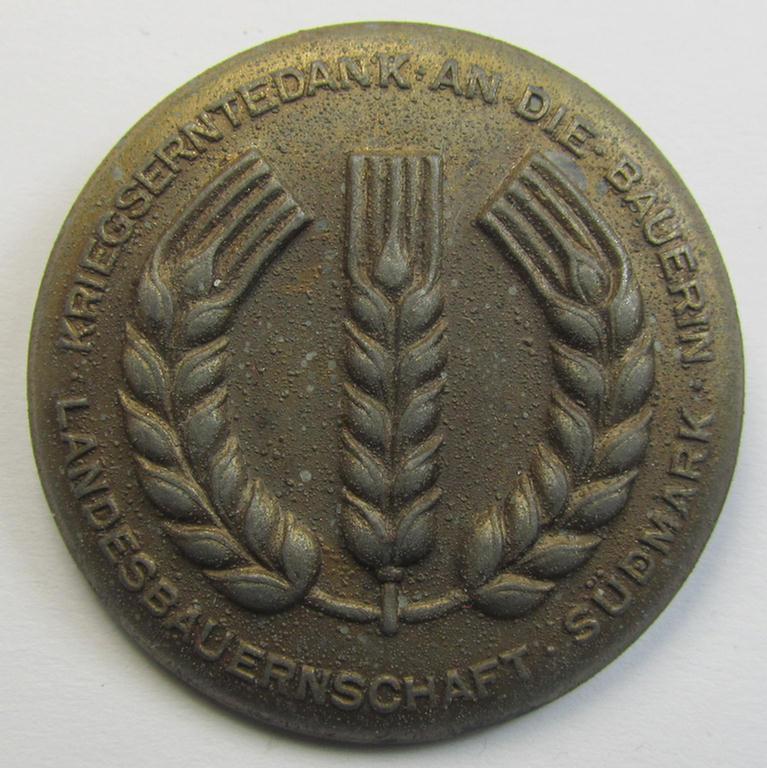 Attractive, so-called: 'Reichsnährstand'- (ie. 'RNSt.'-) related commemorative brooch ('Brosche') being a maker- (ie. 'C. Poellath'-) marked example showing the text: 'Kriegserntedank an die Bauerin - Landesbauernschaft Südmark'