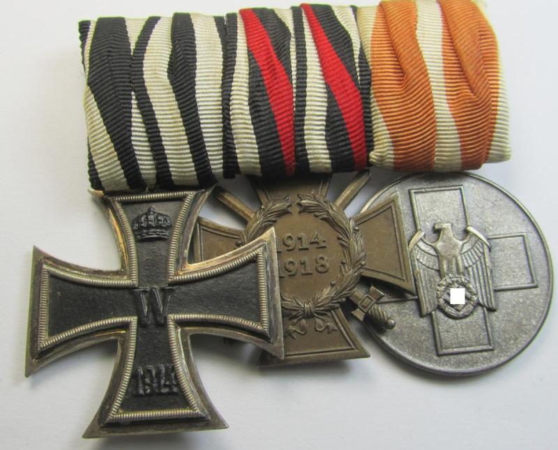 Attractive, WWI- (ie. TR-) period so-called: 'Ordenspange' (being of the desirable 'detachable'-pattern!) showing resp. an: 'EK II. Kl.'. a: 'FKK 1914-18 mit Schw.' and a: 'Deutsche Volkspflege'- (ie. civil-service-) medal