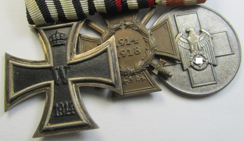 Attractive, WWI- (ie. TR-) period so-called: 'Ordenspange' (being of the desirable 'detachable'-pattern!) showing resp. an: 'EK II. Kl.'. a: 'FKK 1914-18 mit Schw.' and a: 'Deutsche Volkspflege'- (ie. civil-service-) medal