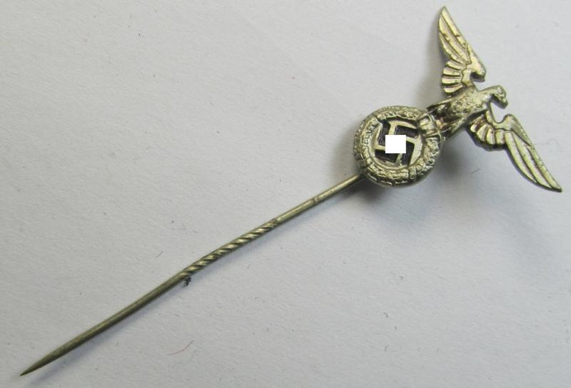 Silverish-coloured - and truly very detailed! - so-called: 'N.S.D.A.P.'-supporter- (ie. membership-) lapel-pin (ie. 'tie'-pin) being a non-maker-marked example showing a pronounced (early pattern) 'Reichsadler'-device