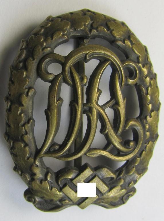 Attractive - and I deem just moderately worn- ie. used! - 'Reichssportabzeichen DRL in Bronze' (or: DRL sports'-badge in bronze) being an example that is nicely maker- (ie. 'Wernstein - Jena'-) marked on its back