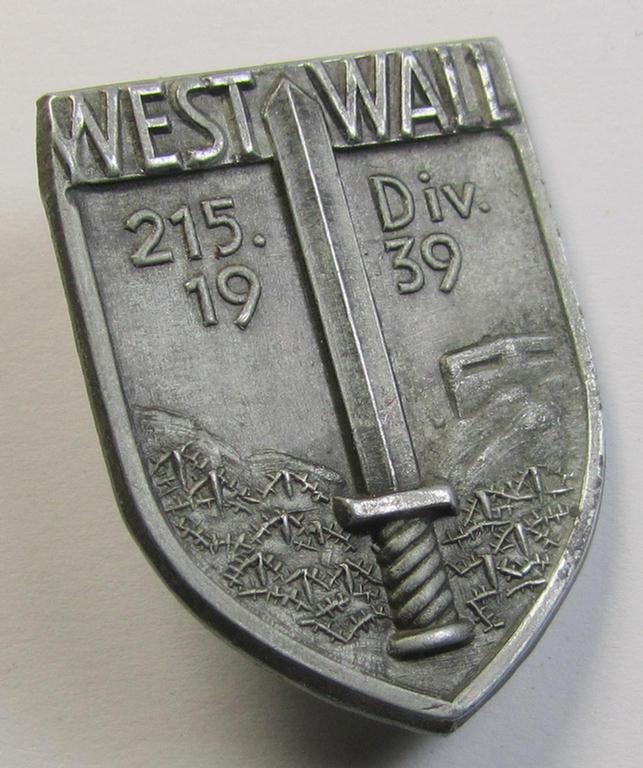 Attractive - and actually quite scarcely encountered! - WH (Heeres) so-called: 'Truppen-Traditionsabzeichen des 215. Infanterie Division' as executed in greyish-coloured zinc-based metal (ie. 'Feinzink')
