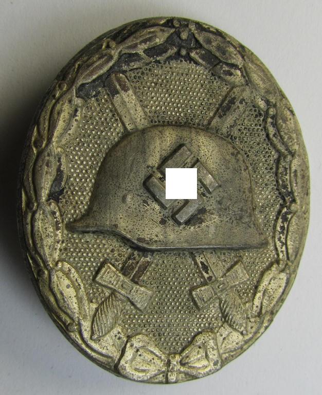 Neat, silver-class woundbadge (or: 'Verwundeten Abzeichen in Silber') being a nicely maker- (ie. '107'-) marked example (as was produced by the desirable 'Hersteller' ie. maker: 'Carl Wild')