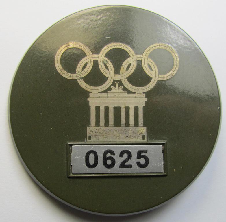 Rarely found, larger-sized- and/or darker-green-toned so-called: 'Dienstplakette als Ausweismarke für die Angehörigen des Betriebsdienstes des XI. Olympischen Spiele 1936' held in Berlin that is bearing a unique serial-numeral that reads: '0625'