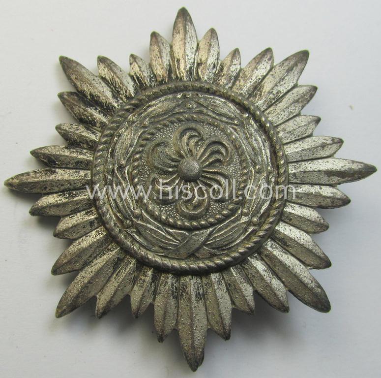 Attractive, WH-related, so-called: 'Verdienstauszeichnung o. Steckkreuz für Angehörige der Ostvölker, 1. Kl. in Silber ohne Schwertern' being a non-maker-marked example that comes in an overall nice condition