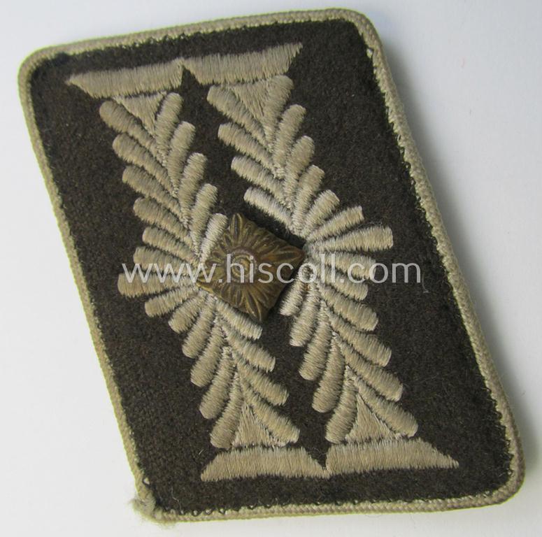 Attractive - regrettably single but nevertheless rarely found! - so-called: 'OT'- (ie. 'Organisation Todt'-) related, brown-coloured- and/or woolen-based, 'high-ranked' officers'-type collar-tab as was intended for an: 'OT-Oberbauleiter'