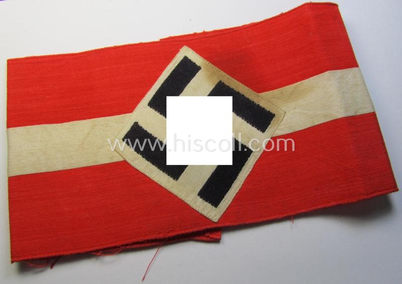 Attractive - and nowadays scarcely found! - 'standard'- (ie. entirely woven) pattern, bright-red-coloured HJ- (ie. 'Hitlerjugend'-) related armband (ie. 'Armbinde') being a moderately worn- ie. used example that regrettably misses its 'RzM'-etiket