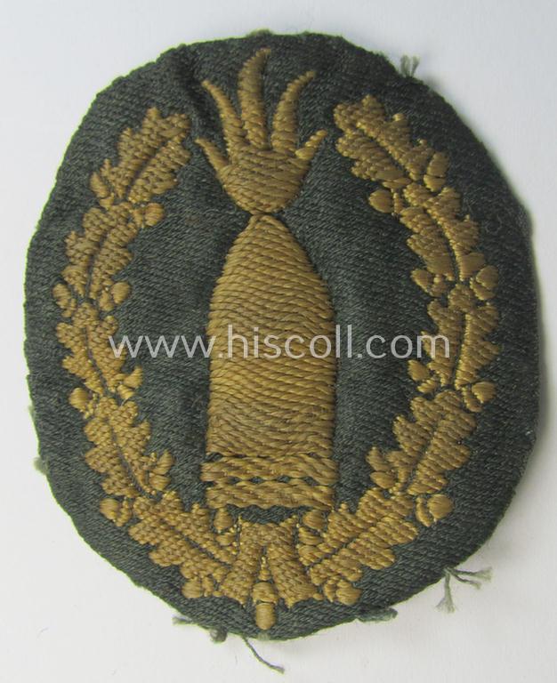 Neat - moderately used- and/or worn! - example of a WH (Heeres) 'Richtabzeichen für Artillerie-Richtkannoniere' (or: artillery gun-layers patch) as executed in neat 'BeVo-weave'-pattern (and that comes in a carefully tunic-removed condition)