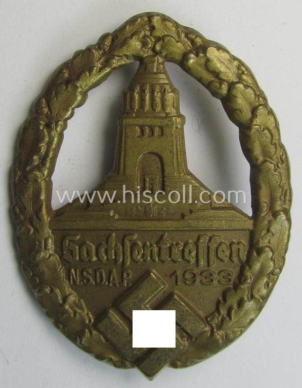 Commemorative, tin-based- and/or: bright-golden-coloured, early-period N.S.D.A.P.-related 'tinnie' being a non-maker marked example depicting the 'Kyfhäuser'-monument and 'swastika'-device and bearing the text: 'Sachsentreffen N.S.D.A.P. 1933'