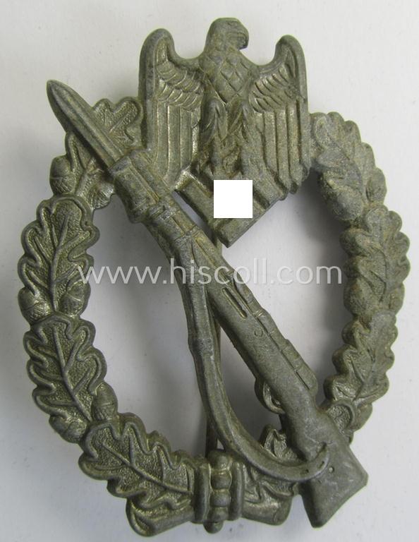 Moderately used, 'Infanterie-Sturmabzeichen in Silber' being a non-maker-marked- and/or zinc- (ie. 'Feinzink'-) based specimen of the so-called: 'pillow-crimped'-pattern (as was produced by a to date still unidentified maker)