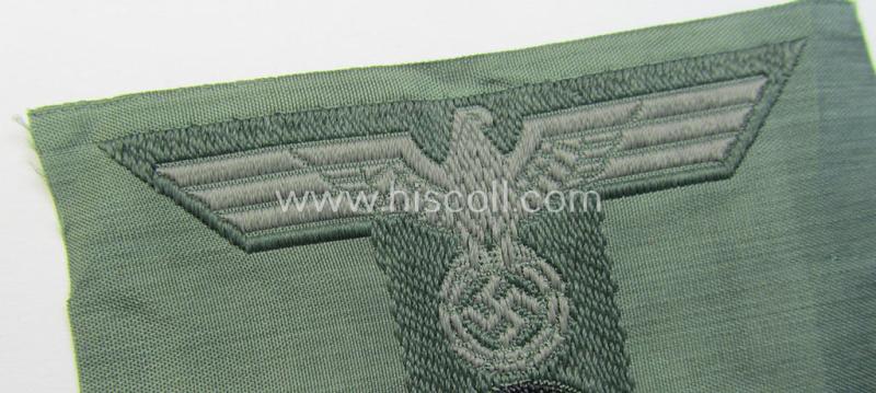 WH (Heeres) 'T-shaped' M42-model cap-eagle/cocarde as executed in 'BeVo'-weave pattern (being an attractive example that comes in a never used- nor cap-attached, condition)